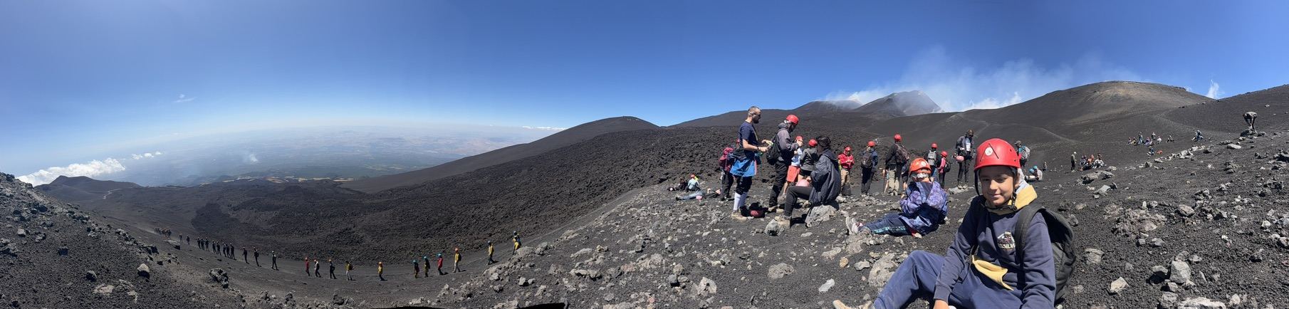 Panoramic view from Mount Etna crater with Sicilian coast visible