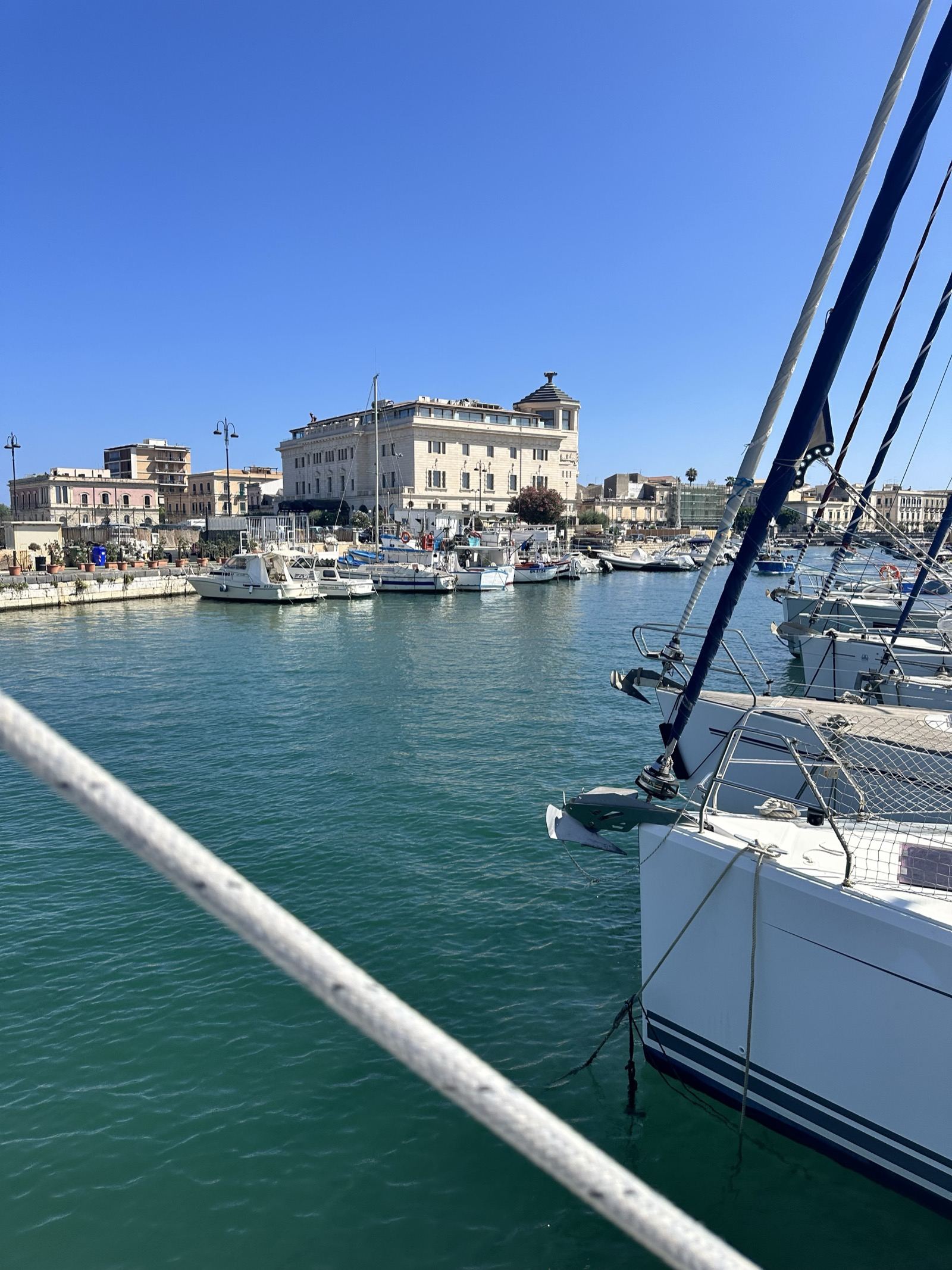 Syracuse harbour with sailing yacht Cornelia